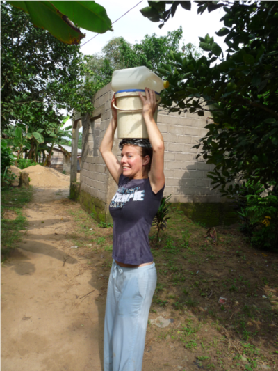 Madelon Eelderink fetching water, Cameroon